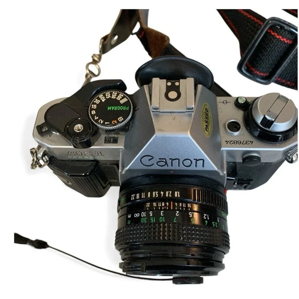 Canon AE-1 Program SLR 35mm Film Camera w/ 50mm F/1.8 Lens & Camera Bag & More